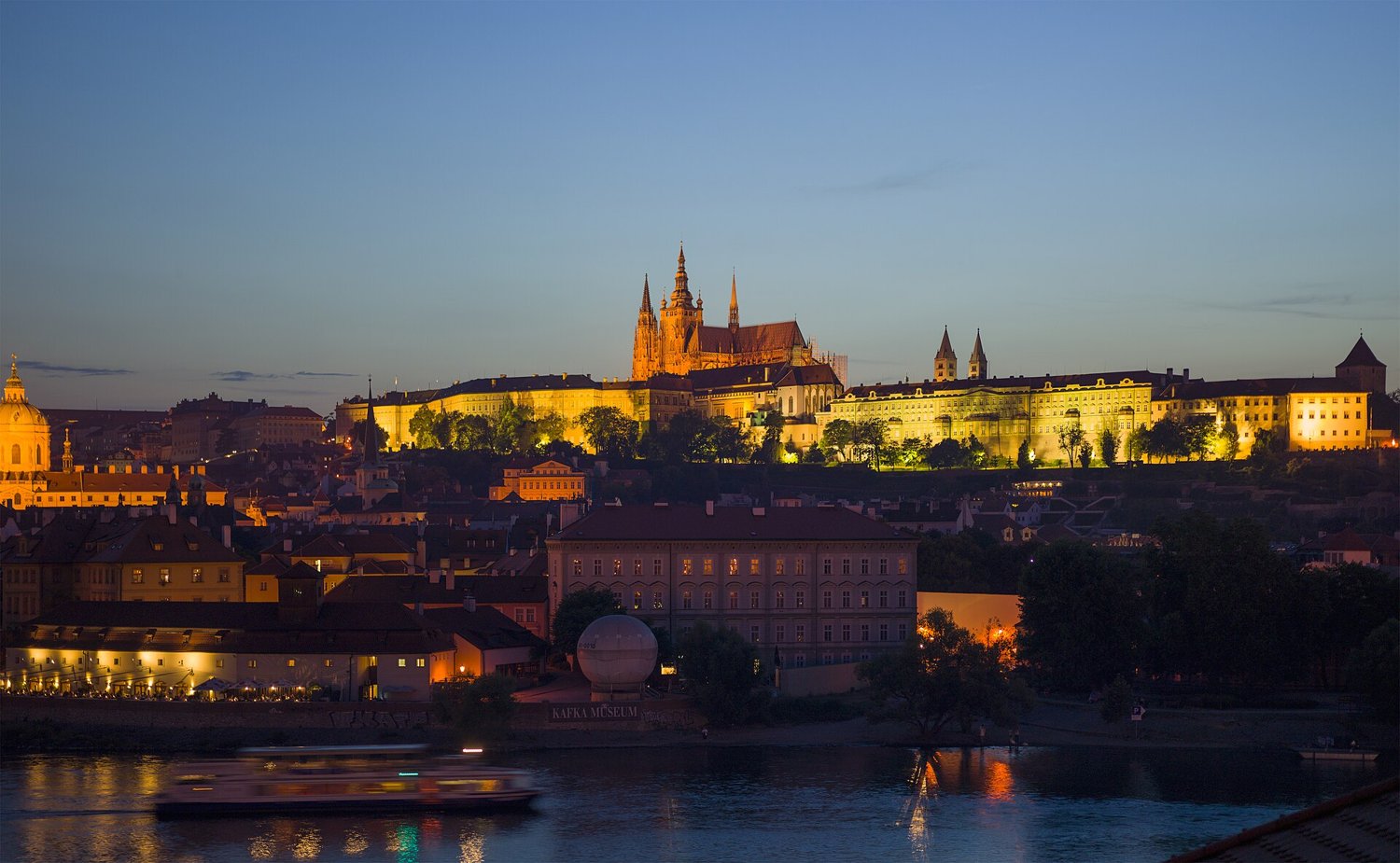 Prague Castle above the Vltava at dusk