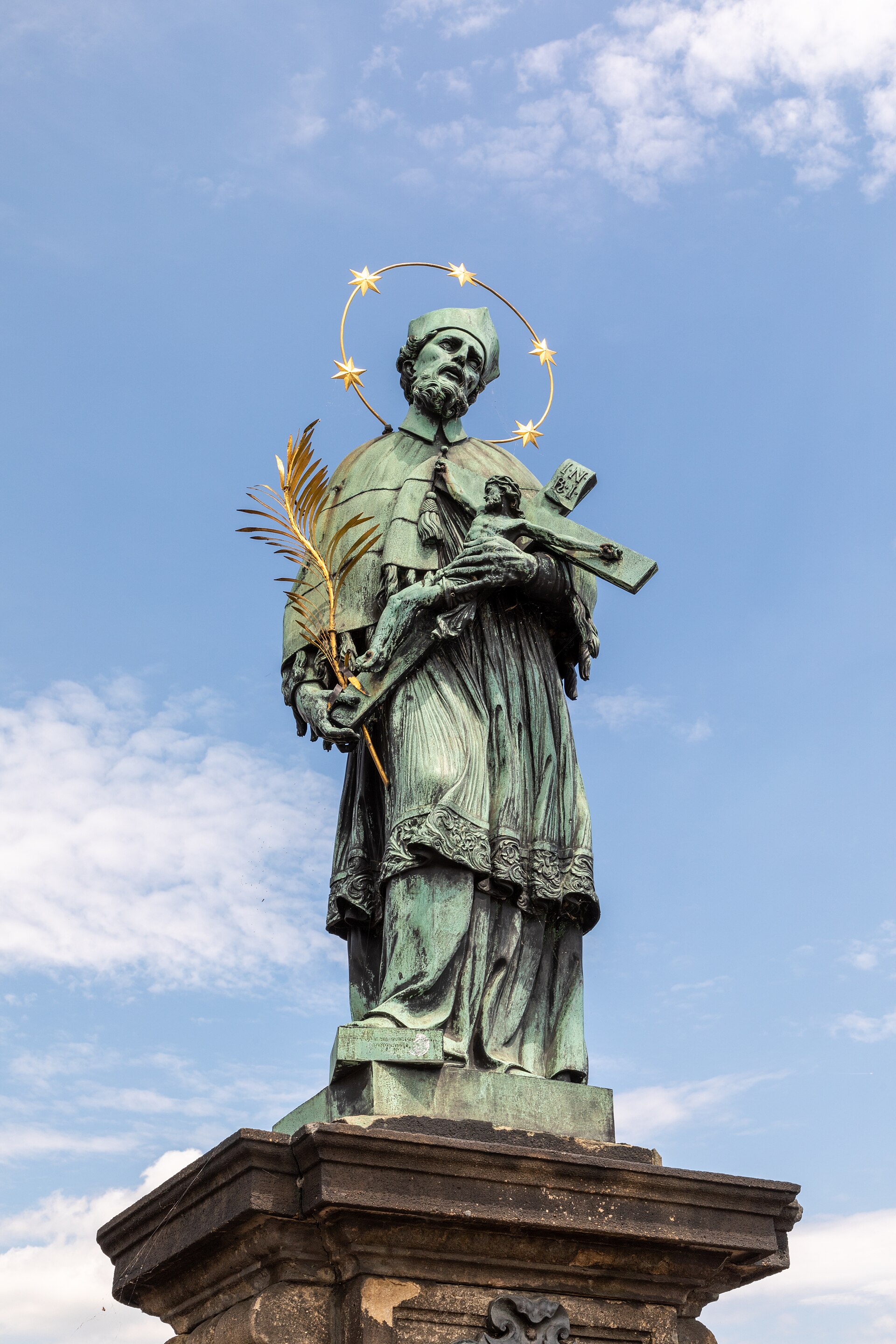 The statue of John of Nepomuk on Charles Bridge